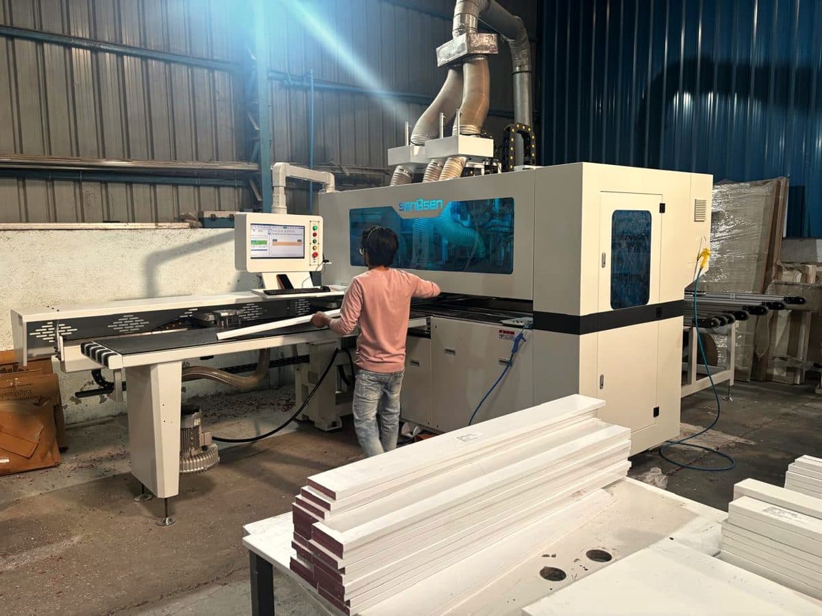 An operator at the six-side drilling machine
